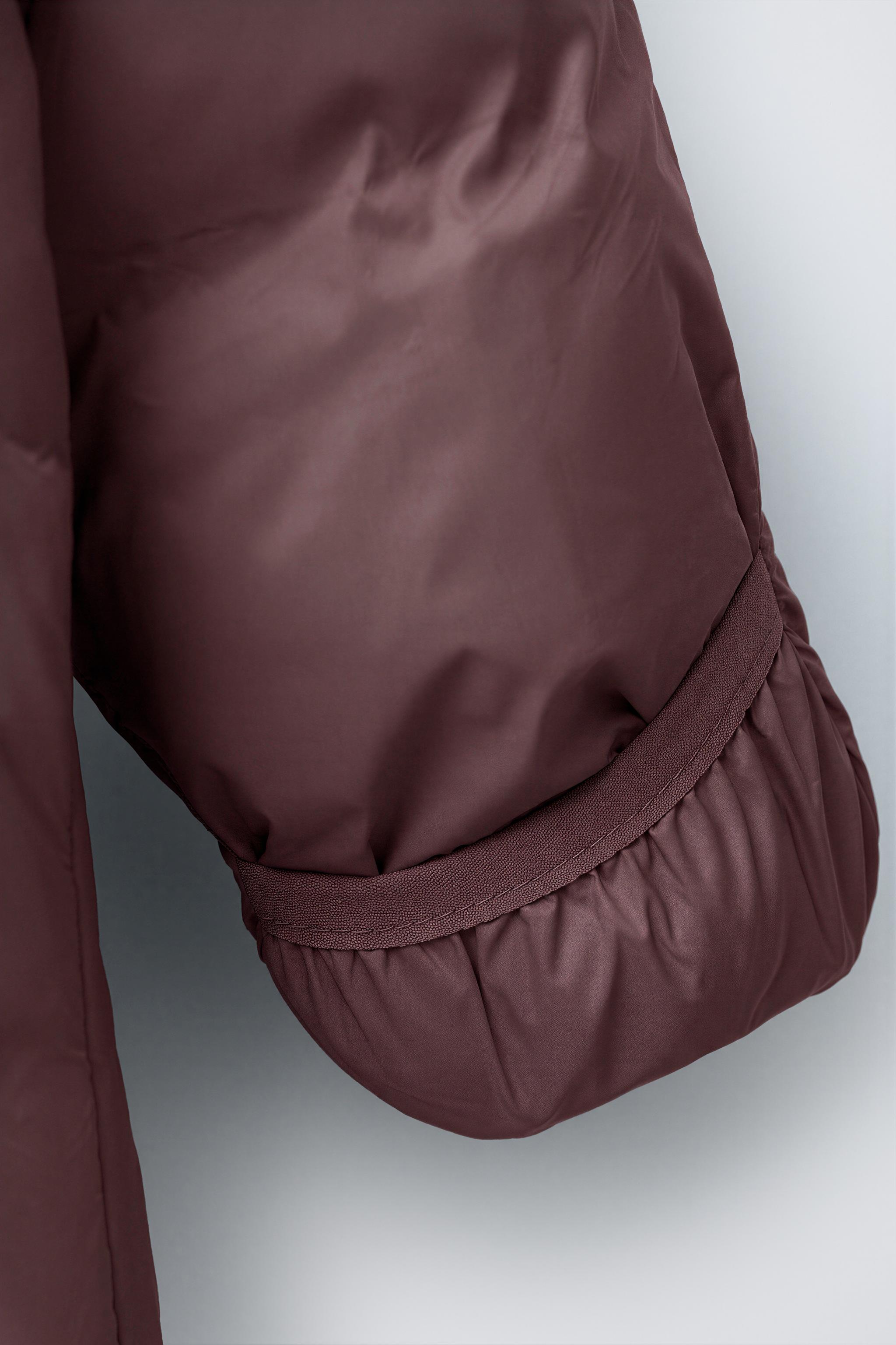 COMBINAISON EN NYLON PIEDS CONVERTIBLES